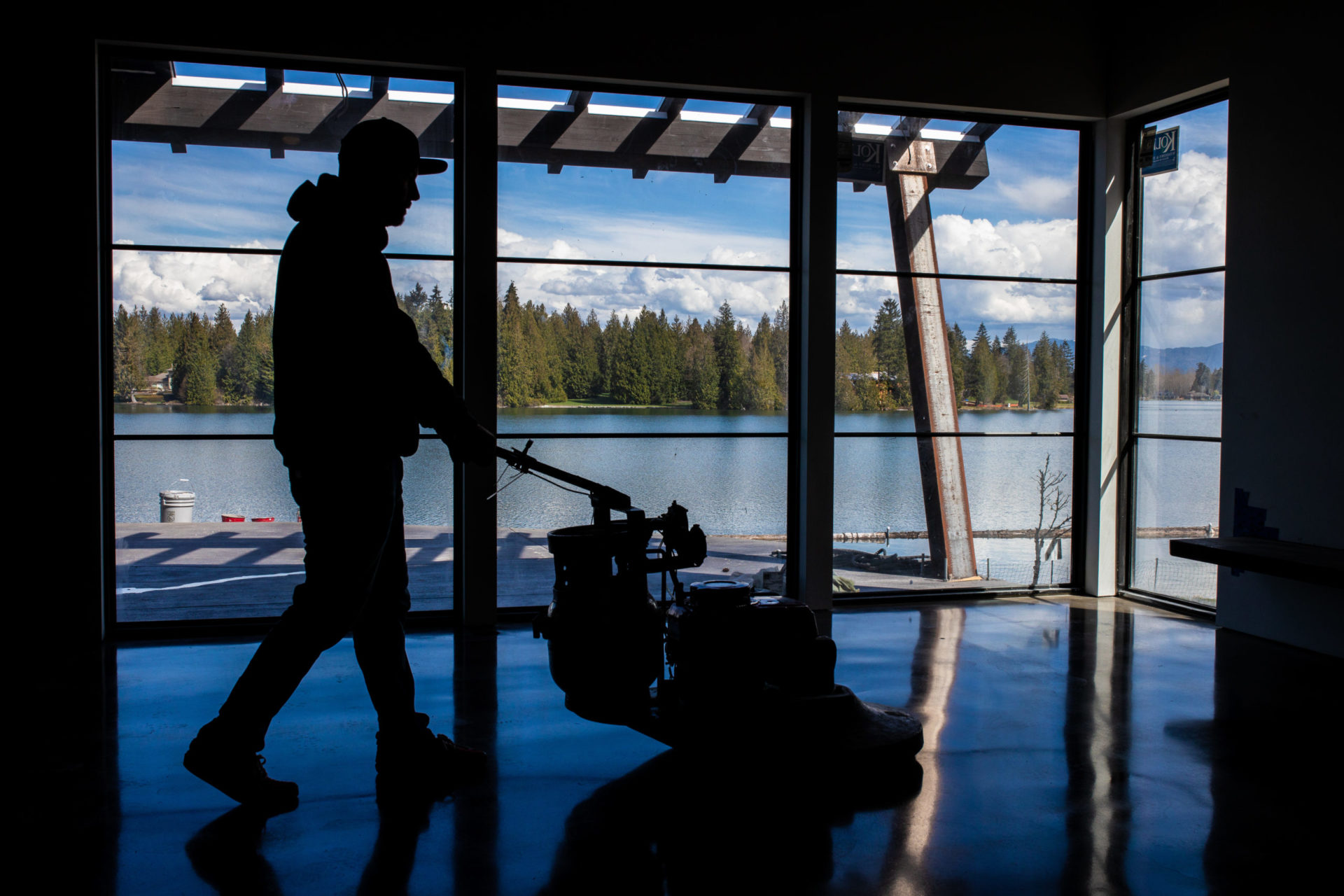 A professional providing concrete polishing services in Seattle, WA